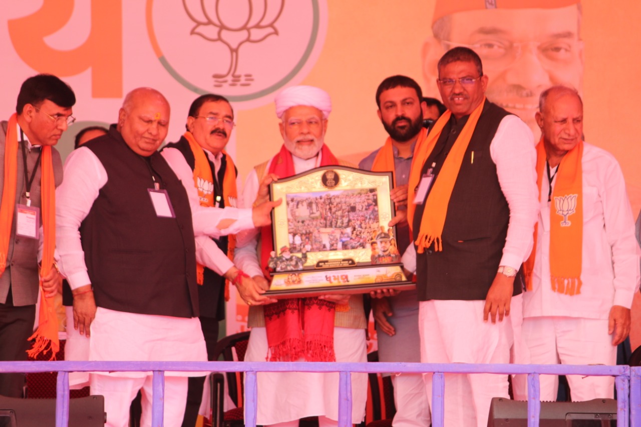 Upcoming Dhaman Gujarati movie's producer Bhupat Bodar presents memento to PM Modi behalf of his Dhaman team